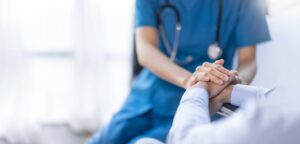 Primary care provider discussing a coordinated healthcare plan with a patient during a routine visit